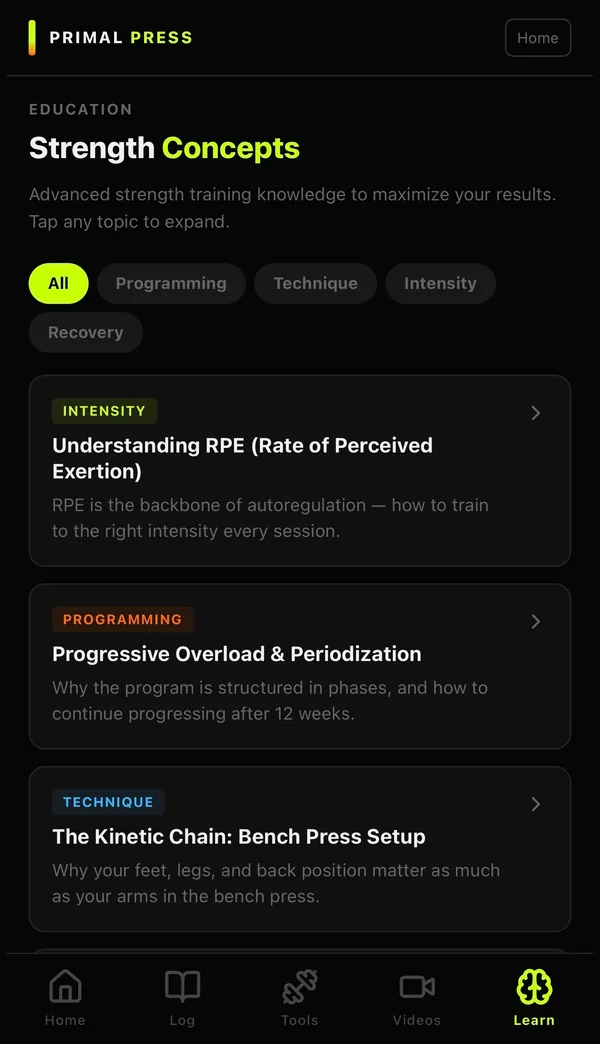 The Primal Press Protocol app on a phone showing the Strength Concepts library, including a lesson on the kinetic chain and bench press setup.